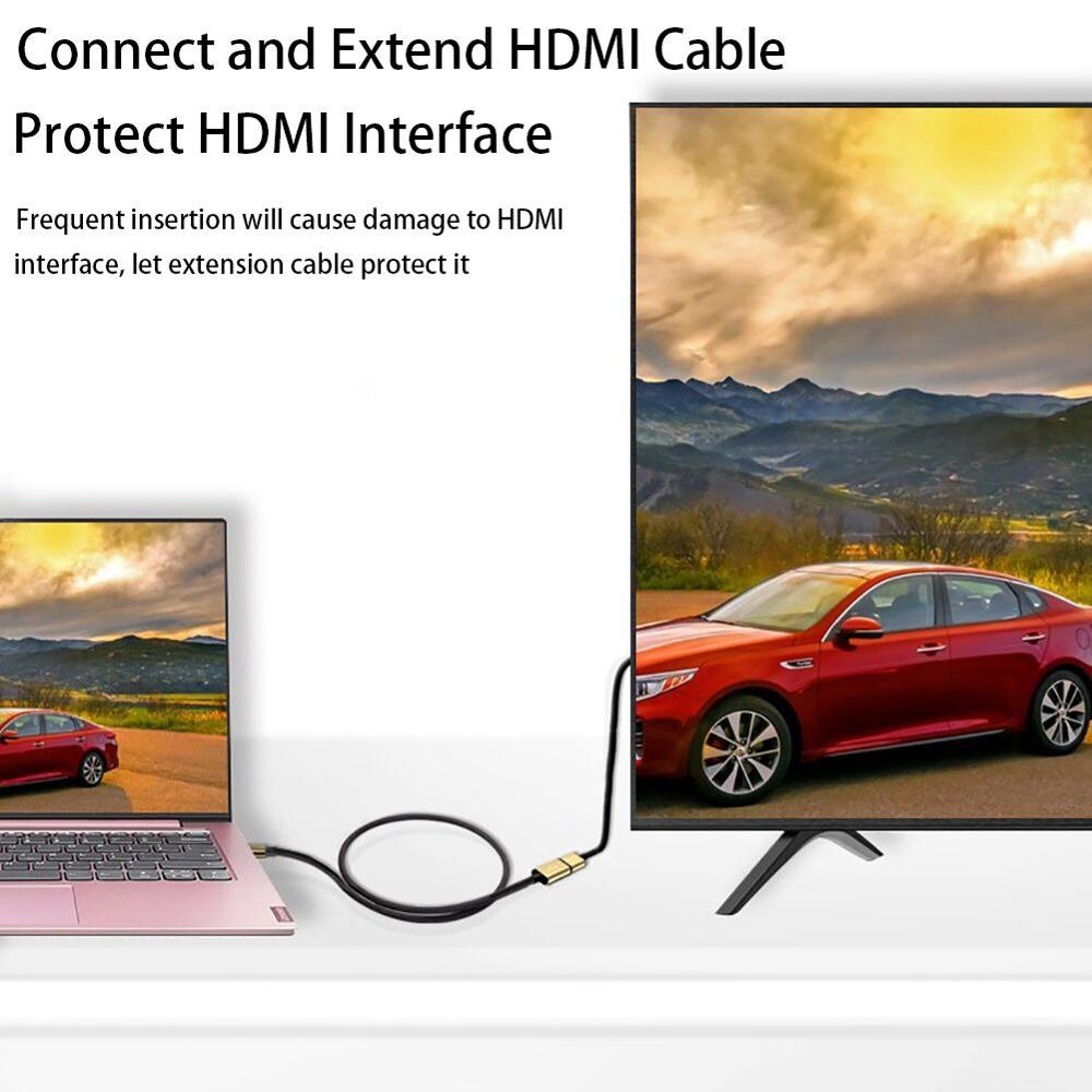 HDMI extension cable connecting a laptop to a display