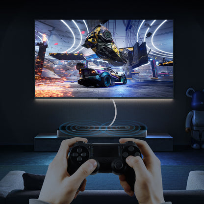 Digital optical audio cable used in a TV gaming setup